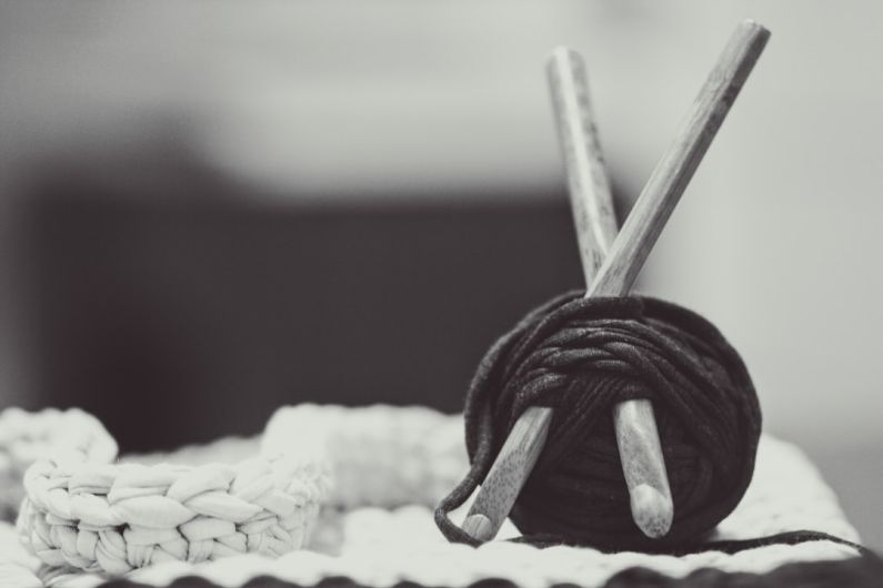 Diy Textile - gray wooden sticks with black yarn