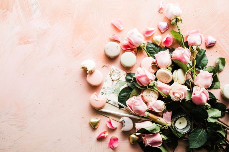 Valentines - flat-lay photography of macaroons and pink rose flowers