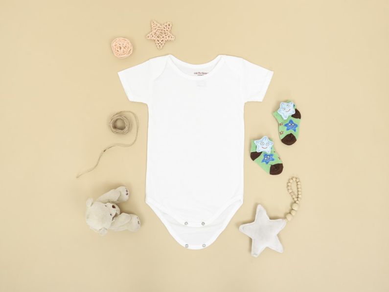 Baby Shower - babys white and blue onesie